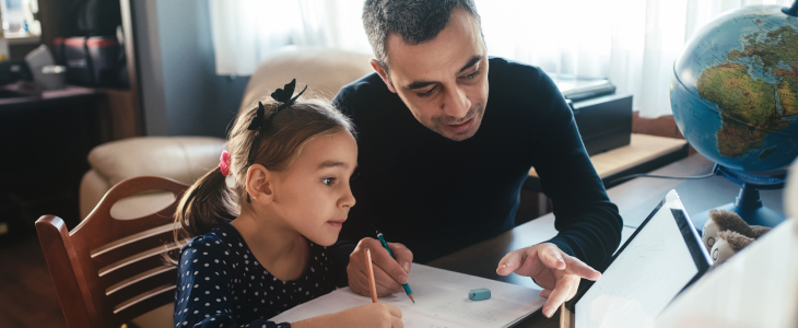 Father teaching his daughter
